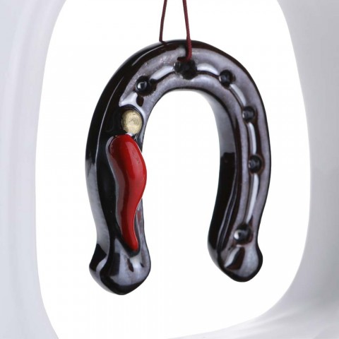 Cornice in ceramica bianca con Ferro di Cavallo e cornetto Macri